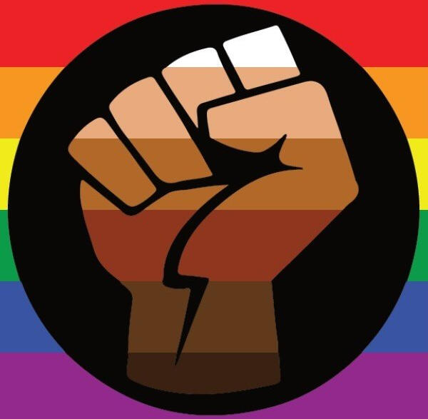 Black graphic of a raised fist filled in with a range of skin tone shades overlaid on top of a rainbow background.